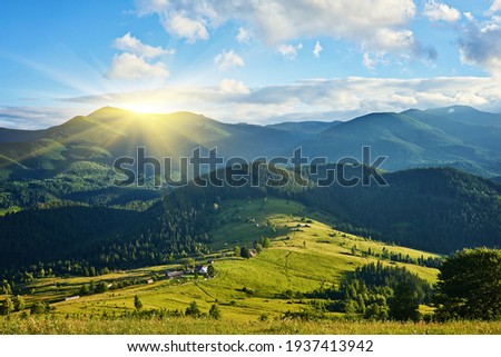 Summer landscape in mountains and the dark blue sky with clouds Royalty-Free Stock Photo #1937413942