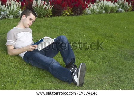 Guy reads a book.