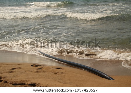Undersea Internet cable in Atlantic shore Royalty-Free Stock Photo #1937423527