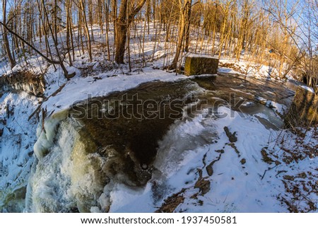 Smokey Hollow Waterfalls Conservation Area Ancaster Ontario Canada in Winter through wide angle lens