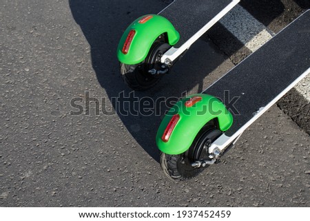 New electric scooter wheels parking on the sunlight