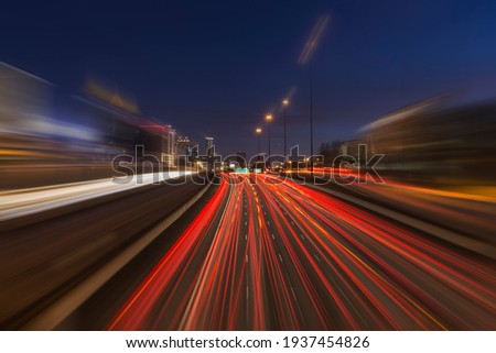 Night freeway traffic with motion blur in midtown Atlanta Georgia.