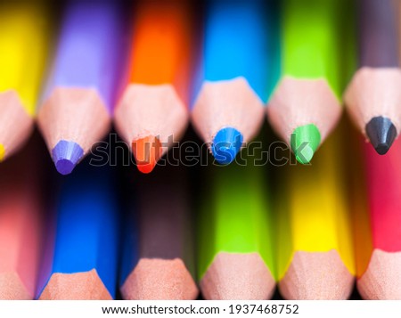 ordinary colored wooden pencil with soft lead of different colors for drawing and creativity, close-up of pencils after sharpening and use, pencil made of natural eco-friendly materials for children