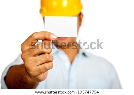 Asian engineer man show a blank card close his face focus on the card isolated on white background