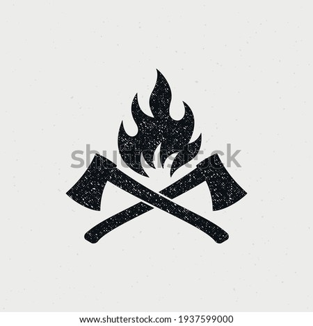 Black and white illustration of crossed axes, fire on a background with a texture. Vector illustration in vintage style with grunge texture for emblem, print, label, badge and sticker. Royalty-Free Stock Photo #1937599000