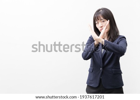 Woman expressing NO sign (gesture)