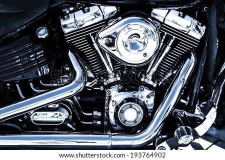 Shiny chrome motorcycle engine block Royalty-Free Stock Photo #193764902
