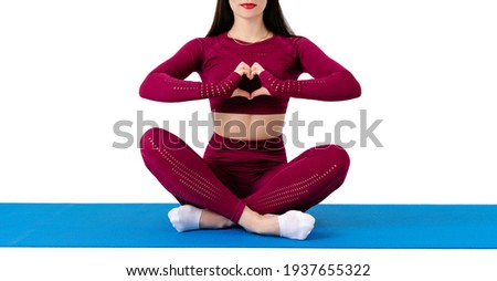 Unrecognizable caucasian woman doing yoga exercises on white background