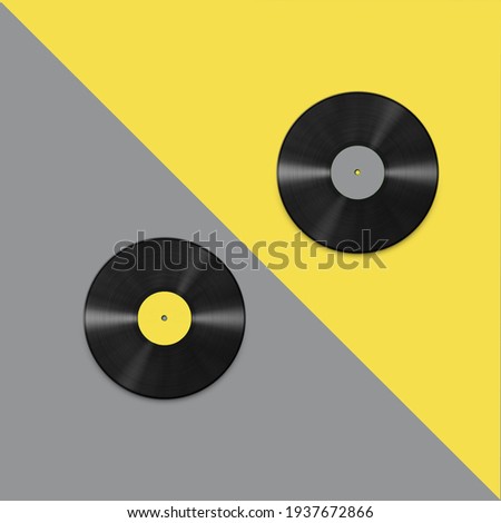 On a light gray background, here are vinyl records