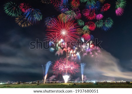 This is the photography of Shinmei no Hanabi fireworks festival.

How about using this image to the background of a calendar, a poster and travel pamphlet. Royalty-Free Stock Photo #1937680051