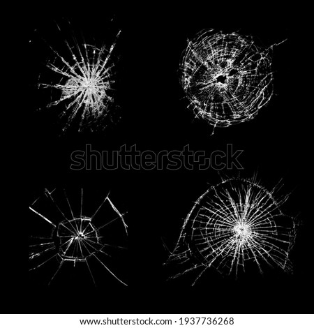 Set of cracked and chipped broken glass on black background. Abstract collage with cracked window texture.
