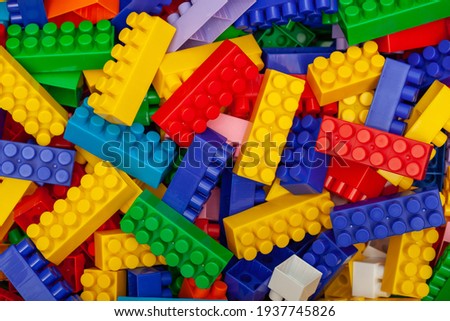 Multicolored plastic building blocks of the designer Royalty-Free Stock Photo #1937745826