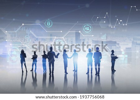 Silhouettes of office white collars with planners and papers on digital surface. Data icons, graphs and personal information as hologram. Concept of teamwork and communication. New York on background