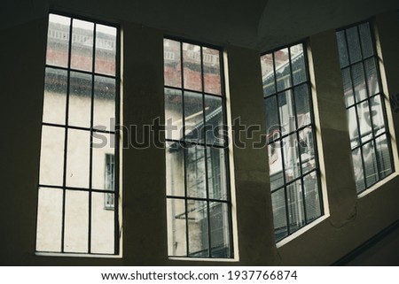 Modern architecture. Futuristic windows at a railway station. Broken lines, geometry and perspective. Stock photography.