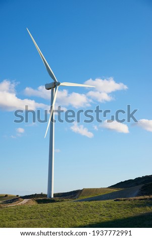 Wind turbines for electric power production, Zaragoza Province, Aragon in Spain. Royalty-Free Stock Photo #1937772991