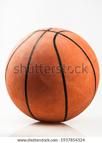 Basketball ball over white background. Orange ball, sports concept. 
