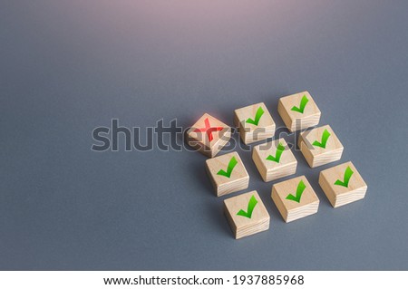Red cross disturbs order of block structure. Violation of terms of contract, termination of deal. Artificial bureaucratic corruption obstacles. System problems, malfunctions and breakdowns. Integrity Royalty-Free Stock Photo #1937885968