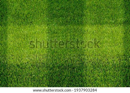 The detail of artificial green grass soccer field for backgroud