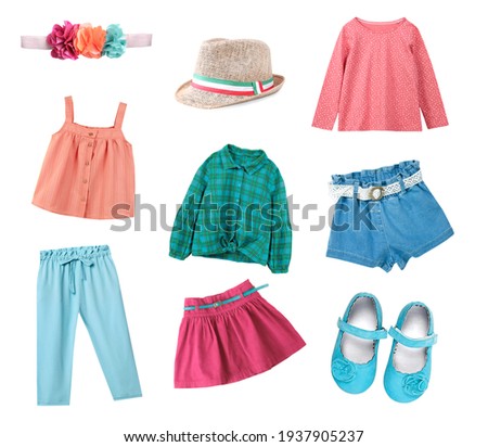 Child's clothes isolated on white.Kid's clothing collage.Girl's wear.Colorful fashion apparel. Royalty-Free Stock Photo #1937905237