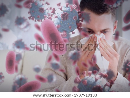 Composition of covid 19 cells over sick man blowing his nose. global coronavirus pandemic and health concept digitally generated image.