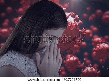 Composition of covid 19 cells and sick woman blowing her nose. global coronavirus pandemic and health concept digitally generated image.