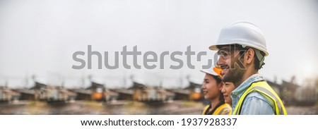 Railway engineer team are standing and looking forward confidently in a successful job, use for banner cover. Royalty-Free Stock Photo #1937928337