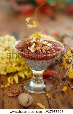 Chia Pudding with Quince and Walnuts. Autumn and season holidays healthy dessert.