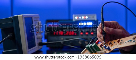 PCB witch microcontroller in electronics laboratory Royalty-Free Stock Photo #1938065095