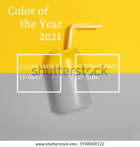 Aluminum can with straw on illuminating yellow and ultimate gray. Color trend of the year 2021