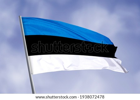 Estonia flag isolated on sky background. close up waving flag of Estonia. flag symbols of Estonia.