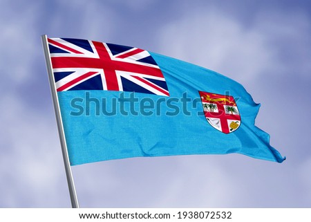 Fiji flag isolated on sky background. close up waving flag of Fiji. flag symbols of Fiji.