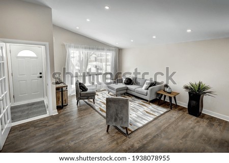 Luxury Canadian House Completely Renovated, Furnished and Staged with Basement, Deck, Backyard and Garage for Sale Royalty-Free Stock Photo #1938078955