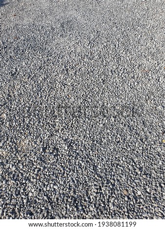 closeup of stones in parking lot