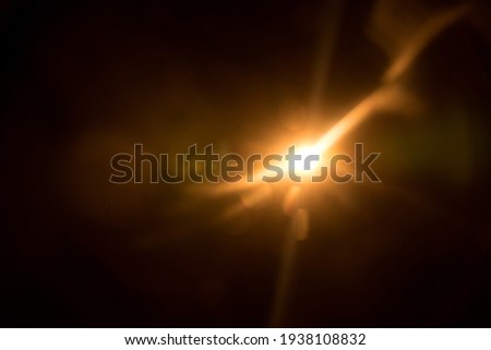 Abstract Natural Sun flare on the black Royalty-Free Stock Photo #1938108832