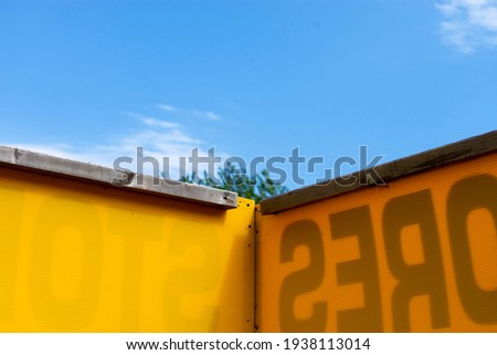 Back of a yellow sign
