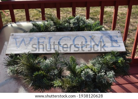 Welcome sign on a wreath