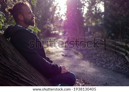 Silhouette of a man sunbathing