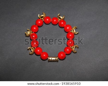 Colorful glamour bead bracelet isolated on a dark background