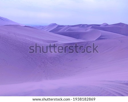 Purple sand dunes in violet desert fairy planet, magical alien landscape, vast horizon, lilac color, dream mood, zen.