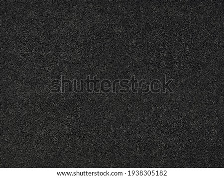 Closeup of a carpet floor. With a soft texture, black graphite color. Royalty-Free Stock Photo #1938305182