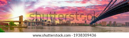Brooklyn Bridge and Manhattan skyline, panoramic view of New York City.