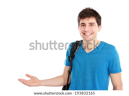 young casual male presenting something with a smile on his face against white background Royalty-Free Stock Photo #193832165