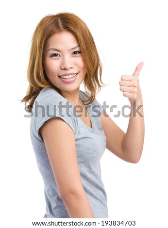 Girl with thumb up gesture