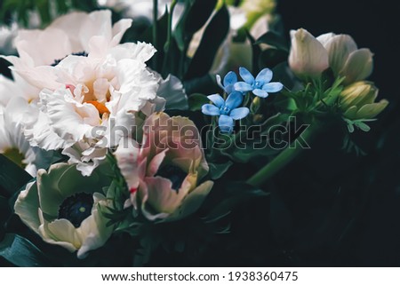 Flower bouquet on black background, beautiful floral arrangement, creative flowers and floristic design ideas