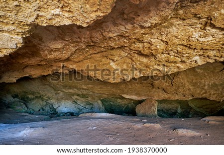 Cyclops Cave – the cave near Konnos Bay famous by the reach history and myths. Ammochostos (Famagusta) District. Cyprus Royalty-Free Stock Photo #1938370000