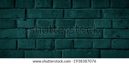 Dark abstract turquoise green painted colored damaged rustic grunge brick wall, masonry, brickwork texture background banner wallpaper template	