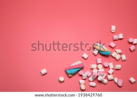 Marshmallows on the pink background, with free space for text.