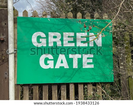 Green Gate Sign Attached to a Wooden Fence at the Westpoint Exhibition Centre in the City of Exeter, England, UK