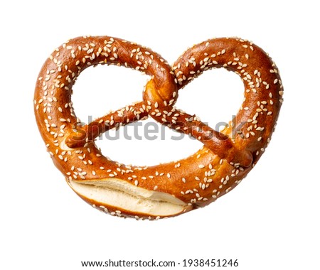Soft pretzel with sesame seeds isolated on white background. Royalty-Free Stock Photo #1938451246
