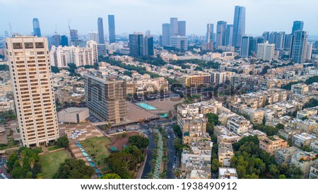 Aerial photo of the oceanside city of Tel Aviv Yafo. Taken from inland the photo shows the entire cityscape including  parks, highways, bridges, residential buildings and the business district. 